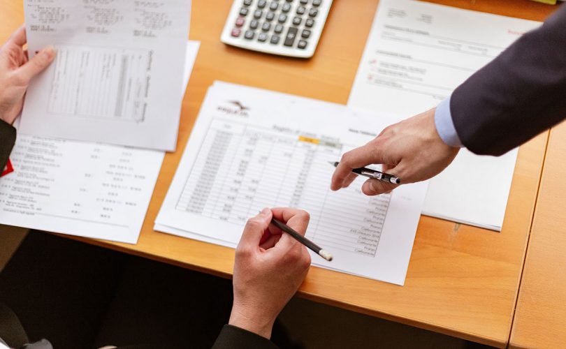 An accountant working at a desk